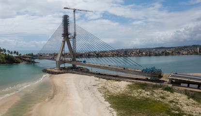 Aerial view of the completion of construction of the new cable-stayed bridge in the city of Ilhéus, Bahia, Brazil.