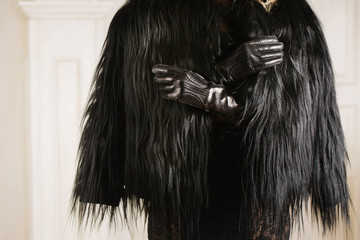 Girl in a black fur coat