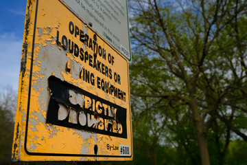 Flaking park sign not allowing noise from loudspeakers or amplifying equipment Toronto