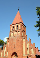 Fototapeta na wymiar the bell Tower of the Church in honor of the Introduction of the blessed virgin Mary (1907). Timofeevo village, Kaliningrad oblast