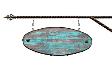 Oval wooden signboard. An old ragged blue blue wooden shopping sign hanging from text hangs on a...