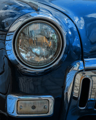 headlight of an antique car color classic blue, close-up. Color of the year 2020. Colorful concept. 
