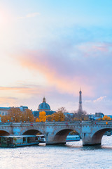 View on Siene river, Institut de France and Eiffel tower. Autumn city Paris, France. Beautiful Paris architecture.