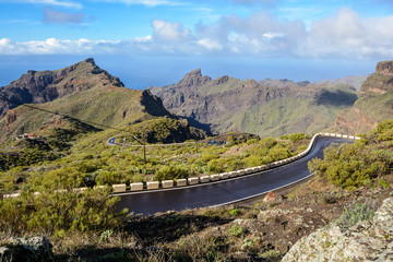Fototapeta na wymiar wet road after rain. mountain wet mountain road after rain. serpentine road. Tenerife Spain