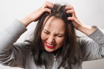 Closeup woman hand itchy scalp, Hair care concept