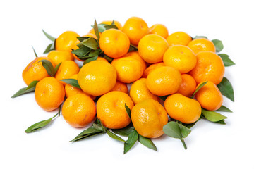 Bright tangerines on a white isolated background.