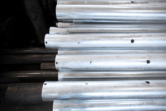 Metal warehouse indoor of steel pipes. Storage of metal galvanized...