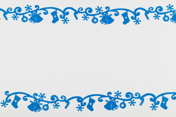 Christmas background with blue felt decoration on white background.