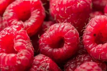 Fresh and sweet raspberries background