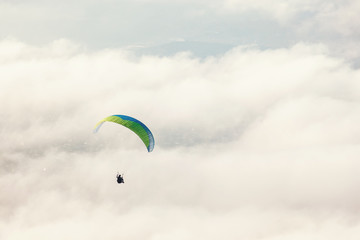 paraglider in the sky at sunset