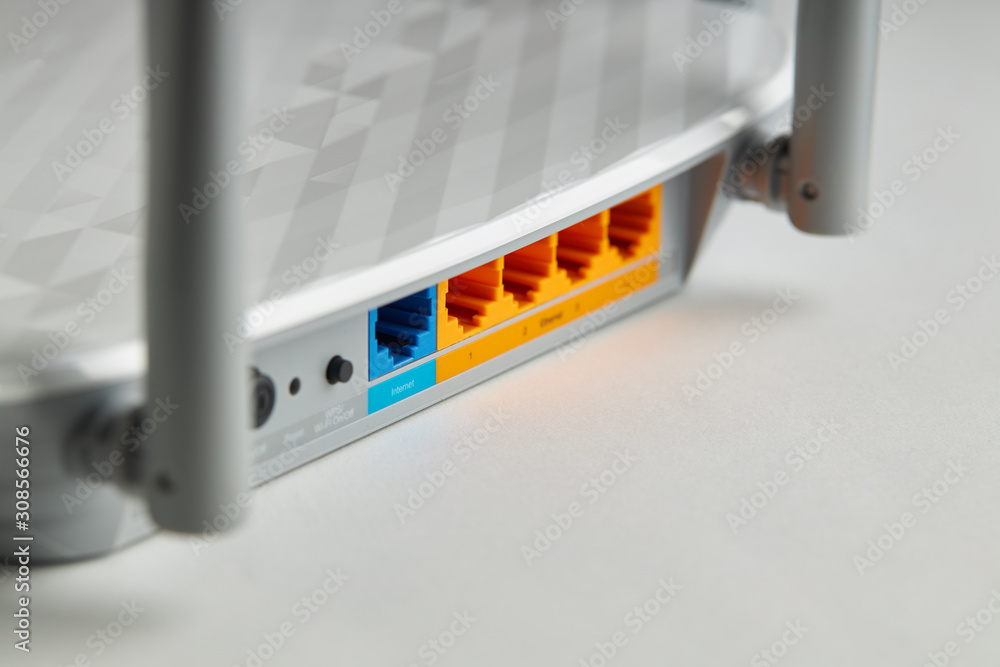 Poster close up wifi internet equipment. colored ethernet panel on wireless hardware. internet concept.