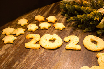 home made biscuits, form 2020, on a brown wood table 