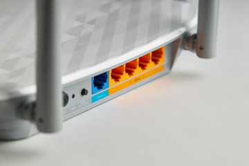 close up wifi internet equipment. colored ethernet panel on wireless hardware. internet concept.