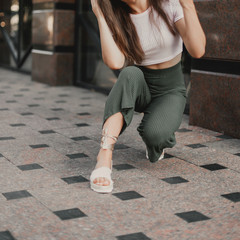 Beautiful model posing for the camera on the streets.