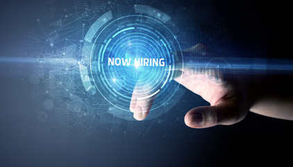 Hand touching NOW HIRING button, modern business technology concept