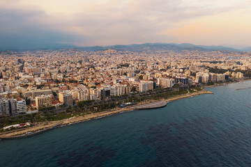 Aerial view of Limassol panorama from air. Cyprus resort town and sea water, drone photo.