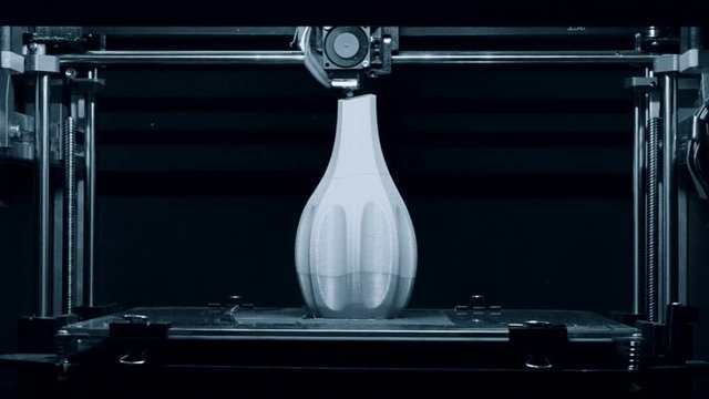 3D printer working. Fused deposition modeling, FDM. 3D printer