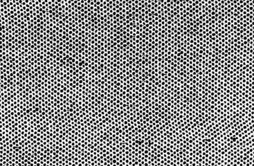 Small uneven spots and particles of debris. Abstract vector texture.  Distressed uneven background. Grunge texture overlay with fine grains isolated on white background. Vector illustration. EPS10.