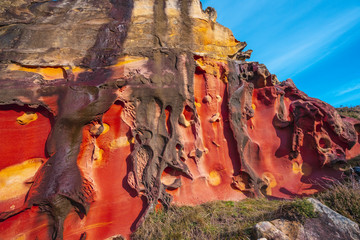 Colored shapes in a magical corner of Mount Jaizkibel. Basque Country