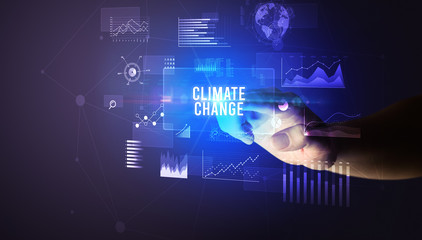 Hand touching CLIMATE CHANGE inscription, new business technology concept