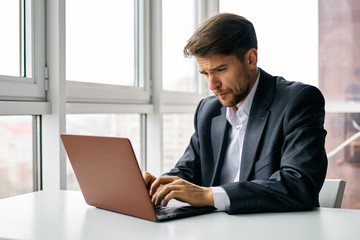 businessman working on laptop in office