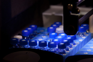 Sample bottles in pharmaceutical laboratory spectrometer