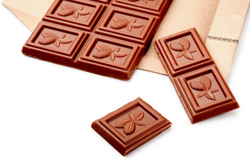 Milk chocolate bar isolated on white background from top view