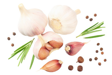 garlic with rosemary, peppercorns and allspice isolated on white background. top view