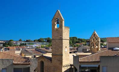Fototapeta na wymiar View of Salon de Provence with typical bell towers, France.