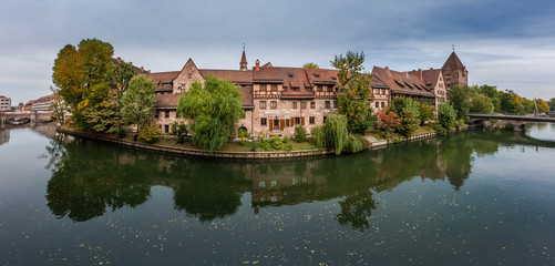 Fototapeta na wymiar Old Residential buildings along the Panitz river, Nuremberg, Germany.