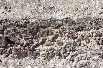 The texture of masonry is mottled