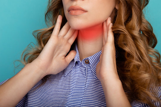 Woman Holding Hands On Her Neck. Throat Sore Concept