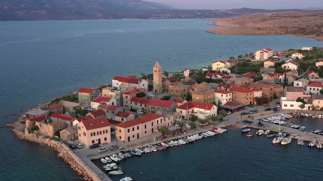 Beautiful old Vinjerac, Croatia, advancing aerial to Catholic church