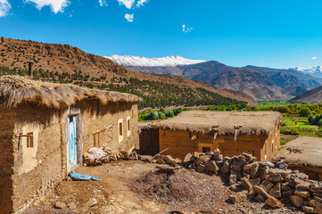 View of adobe houses in the high snow-capped mountains in the Aït Bouguemez valley in Morocco © Nicolas VINCENT