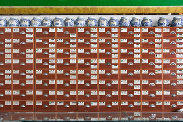 Drawers full of chinese herbal in a traditional medicine shop