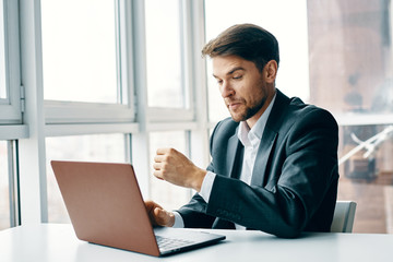 Fototapeta premium businessman working on laptop in office