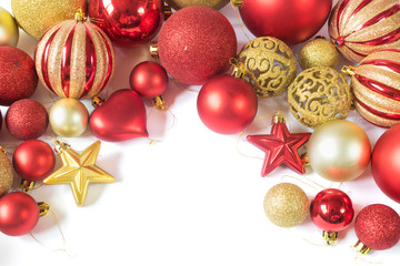 Fototapeta na wymiar Bunch of red and golden christmas baubles isolated on white background