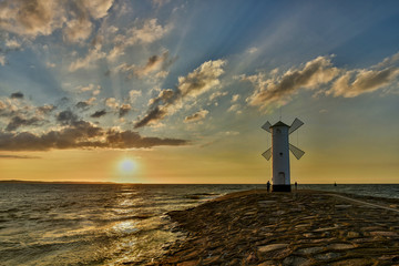 Lighthouse windmill Stawa Mlyny, Swinoujscie, Baltic Sea, Poland.