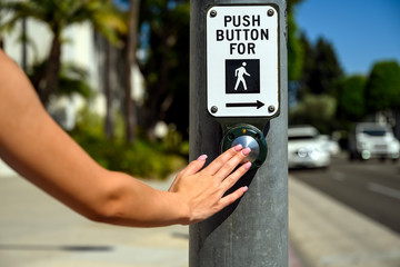 Push button at pedestrian crossing crosswalk street road