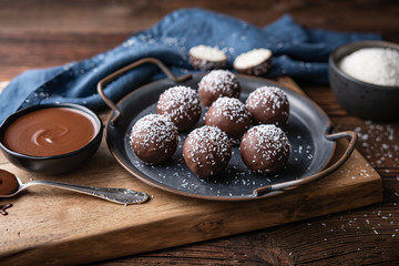 No bake delicious candy, sweet coconut balls dipped in chocolate