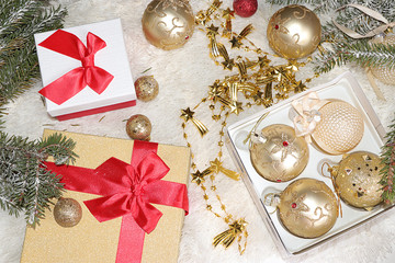 Christmas and New Year background with gift boxes, Christmas trees and Christmas decorations, top view, flet lay. New Year card for congratulations, selective focus, festive atmosphere © Светлана Балынь