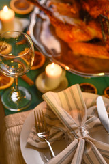 Christmas table, festive baked turkey, and served table. Vertical frame