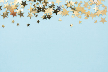 Star shaped golden glitter abstract background