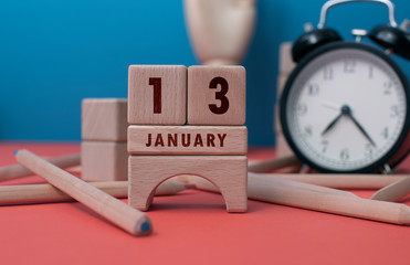 January 13 written with wooden blocks