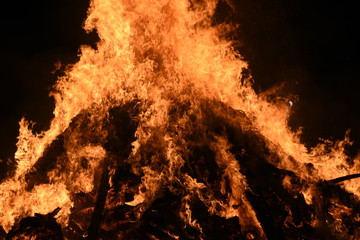 Big Bonfire by Night with Orange Glowing Flames