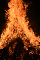 Big Bonfire by Night with Orange Glowing Flames