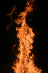 Big Bonfire by Night with Orange Glowing Flames