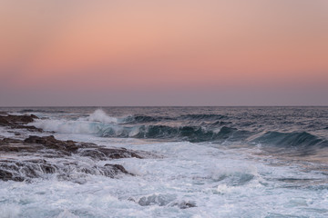 olas en una puesta de sol rosada 3