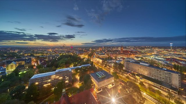 Beautiful evening aerial view of Hannover skyline cityscape. Time lapse.