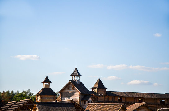 Ancient wooden structure on a blue sky background